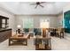 Spacious living room with vaulted ceiling, neutral colors, plush seating, and natural light at 12627 Ninebark Trl, Charlotte, NC 28278
