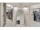 Walk-in closets on either side of the mirror provide ample storage and organization at 1407 Becklow Ct, Wesley Chapel, NC 28079