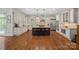 Spacious kitchen with a large island, stainless steel appliances, and plenty of cabinet space at 1407 Becklow Ct, Wesley Chapel, NC 28079