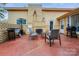 Inviting patio area with brick fireplace and outdoor seating at 143 W College St, Stanley, NC 28164