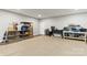 Finished basement offers carpeted and laminate spaces for workshop and creative activities at 154 Shields Dr, Lincolnton, NC 28092
