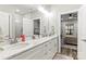 Primary bathroom featuring double sinks with granite countertops and a view to the main bedroom at 154 Shields Dr, Lincolnton, NC 28092
