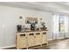 Coffee bar with wooden cabinets, decor, coffee machines, and a window offering natural light at 154 Shields Dr, Lincolnton, NC 28092