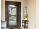 Inviting front door with a welcome mat and decorative welcome sign, creating a warm and inviting entry at 154 Shields Dr, Lincolnton, NC 28092