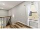 Hallway landing featuring hardwood floors and a staircase down at 154 Shields Dr, Lincolnton, NC 28092