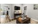 Cozy living room featuring wood floors, a television, and stylish furnishings and decor at 154 Shields Dr, Lincolnton, NC 28092