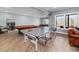 Finished basement featuring a pool table, ping pong table, neutral paint, luxury vinyl plank flooring at 233 Conifer Way, Shelby, NC 28150