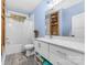 Bright bathroom with blue walls, marble counters and subway tile accents at 233 Conifer Way, Shelby, NC 28150