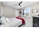 Bright bedroom with large windows and a red accent blanket at 233 Conifer Way, Shelby, NC 28150