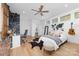 Modern bedroom featuring hardwood floors, a ceiling fan and a writing desk at 233 Conifer Way, Shelby, NC 28150