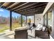 Relaxing covered patio with comfortable seating, scenic views, and ample space for outdoor enjoyment at 233 Conifer Way, Shelby, NC 28150