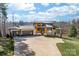Stunning modern home with three-car garage, beautiful landscaping, and a private driveway at 233 Conifer Way, Shelby, NC 28150