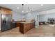 Open floor plan with kitchen, living space and game room at 233 Conifer Way, Shelby, NC 28150