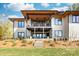 Beautiful two-story home with a spacious covered patio and landscaped backyard at 233 Conifer Way, Shelby, NC 28150