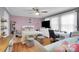 Cozy bedroom with a comfortable bed, desk and chair with decor at 2420 Kannapolis Hwy, Concord, NC 28027