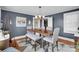 Charming dining room featuring a stylish table, chairs, and a modern chandelier at 2420 Kannapolis Hwy, Concord, NC 28027