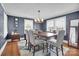 Charming dining room featuring a stylish table, chairs, and a modern chandelier at 2420 Kannapolis Hwy, Concord, NC 28027