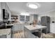 Bright kitchen featuring stainless steel appliances, center island, and sleek countertops at 2420 Kannapolis Hwy, Concord, NC 28027