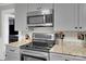 Updated kitchen with stainless steel appliances and granite countertops at 2420 Kannapolis Hwy, Concord, NC 28027