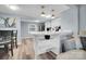 Bright kitchen featuring an island with seating, modern appliances, and access to the living space at 2420 Kannapolis Hwy, Concord, NC 28027