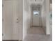 Hallway featuring bare drywall, two doors, and a view to the outdoors at 2508 Rock Dam Rd, Lincolnton, NC 28092