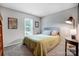 Cozy bedroom featuring natural light, carpet flooring, and a comfortable bed at 2510 Bricker Dr, Charlotte, NC 28273