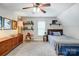 Bedroom features a wooden dresser, accent chair, decorative shelving, and a comfortable bed at 2510 Bricker Dr, Charlotte, NC 28273