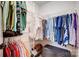 Well-organized walk-in closet with clothing racks, shelving, and ample storage space for shoes and accessories at 2510 Bricker Dr, Charlotte, NC 28273
