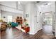 Open-concept living space leading to a dining area and sunroom, perfect for entertaining at 2510 Bricker Dr, Charlotte, NC 28273