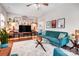 Stylish living room with modern decor, a large TV, and comfortable blue seating at 2510 Bricker Dr, Charlotte, NC 28273