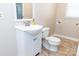 Bathroom featuring a sink with vanity, toilet and tile floors at 2650 31St Street Ne Ct, Hickory, NC 28601