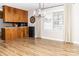 Dining area featuring hardwood floors, lots of light from a window, and a chandelier at 2650 31St Street Ne Ct, Hickory, NC 28601