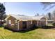 Back exterior of home showing brick construction, and a fenced yard at 2650 31St Street Ne Ct, Hickory, NC 28601