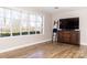 Bright living area boasts hardwood floors, a large window for ample light, and neutral wall paint at 2650 31St Street Ne Ct, Hickory, NC 28601