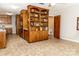 Living space with custom wooden built-ins and tile floors at 2650 31St Street Ne Ct, Hickory, NC 28601