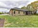 Large backyard featuring a screened-in porch and ample green space at 3012 Ocean Dr, Monroe, NC 28110