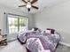 Comfortable bedroom featuring two twin beds with patterned bedding, offering a cozy and inviting space at 3012 Ocean Dr, Monroe, NC 28110
