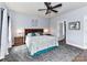 Cozy bedroom with elegant decor, a decorative ceiling fan, and soft lighting, creating a relaxing and inviting atmosphere at 3012 Ocean Dr, Monroe, NC 28110
