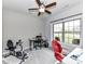 Versatile home office space with a large window, ample desk space, and modern exercise equipment at 3012 Ocean Dr, Monroe, NC 28110