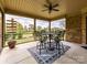Relax on this screened-in porch featuring an outdoor seating area and scenic views of the backyard at 3012 Ocean Dr, Monroe, NC 28110