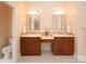 Bathroom featuring double sinks, marble counters, and tile floor at 3071 Ancestry Cir, Matthews, NC 28104