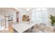 Dining room with modern furniture, natural light and view to foyer at 3071 Ancestry Cir, Matthews, NC 28104