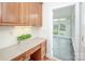 Office space with granite countertops and a view of the sunroom at 3071 Ancestry Cir, Matthews, NC 28104