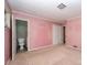 A bedroom offers carpet and access to a connected bathroom at 340 Sardis N Rd, Charlotte, NC 28270
