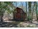 Outbuilding in wooded setting at 340 Sardis N Rd, Charlotte, NC 28270