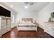 Primary bedroom with a fan, hardwood floors, and lots of natural light at 361 Nance Rd, Stanfield, NC 28163
