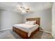 Cozy bedroom with plush carpet, ceiling fan, and natural light at 361 Nance Rd, Stanfield, NC 28163