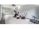 Bonus room with lots of windows, tile flooring, exercise equipment, and neutral walls at 361 Nance Rd, Stanfield, NC 28163