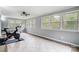 Bonus room featuring lots of windows, tile floor, neutral walls, and ceiling fan at 361 Nance Rd, Stanfield, NC 28163