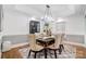 Formal dining room with decorative rug, dining table for six, and buffet at 361 Nance Rd, Stanfield, NC 28163